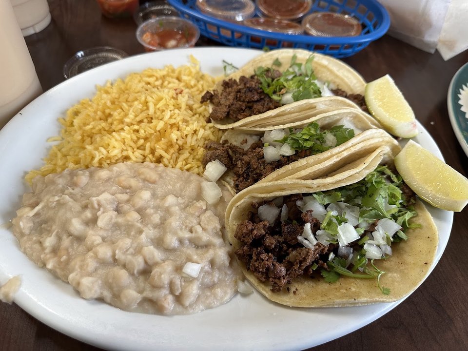 Colorful Mexican dishes on a casual table.