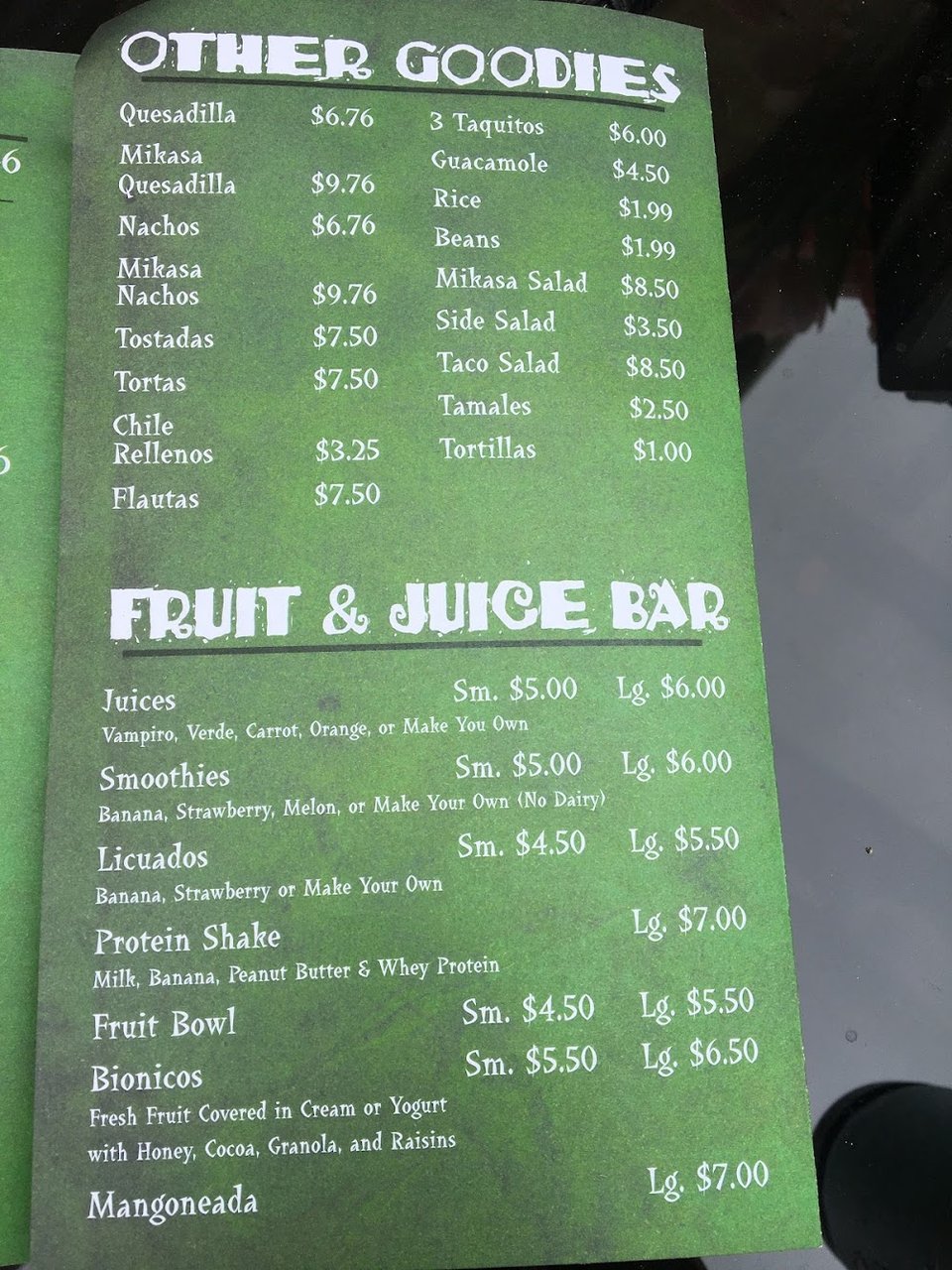 Menu layout with small plates and seafood.